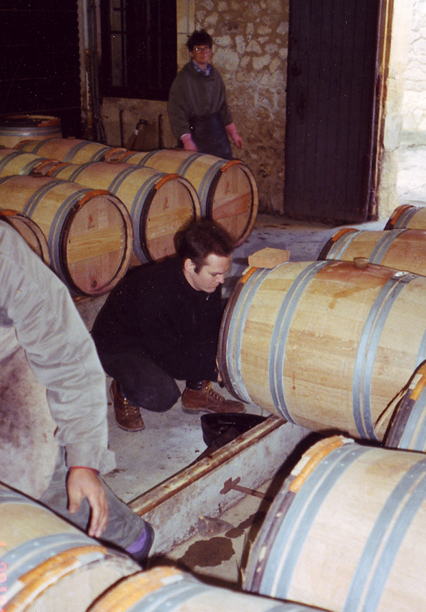Aaron in Front of a Barrel in France